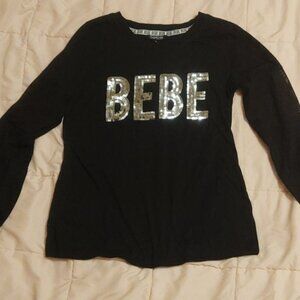 Woman's size medium sparkle Bebe top